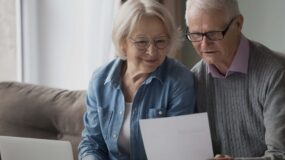elderly husband and wife overseeing charitable gift annuity in the comfort of their home